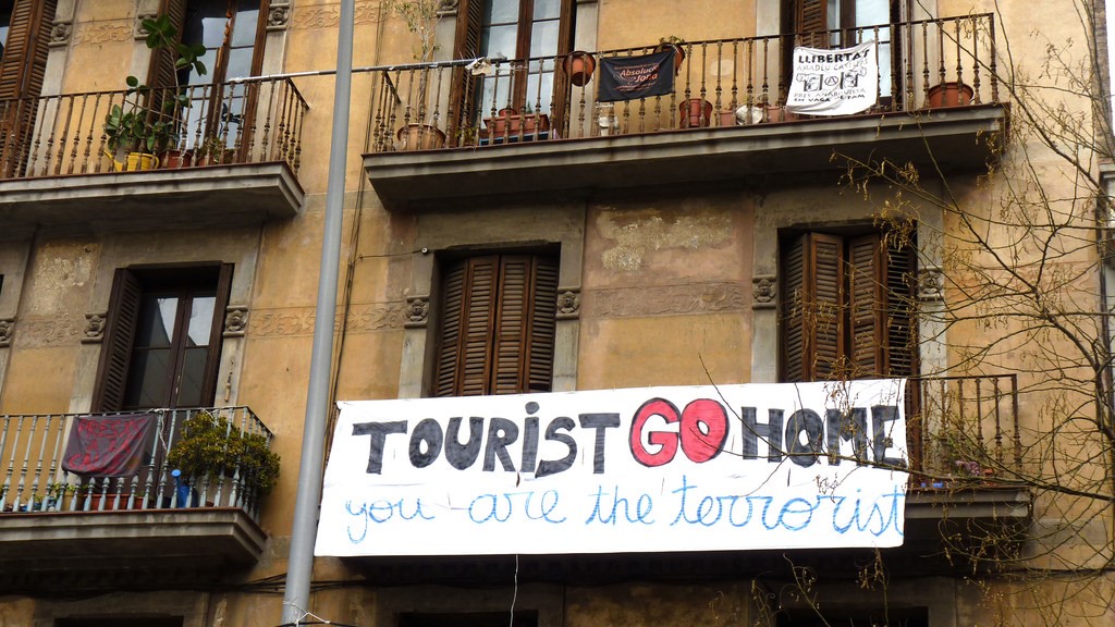Tourists are terrorists now? As anti-tourism sentiment increases with overtourism, will identifying and referring to carrying capacity help tourism avoid choking on its own success? Image by Miltos Gikas (CC BY 2.0) via Flickr https://www.flickr.com/photos/aries_tottle/4379313909


