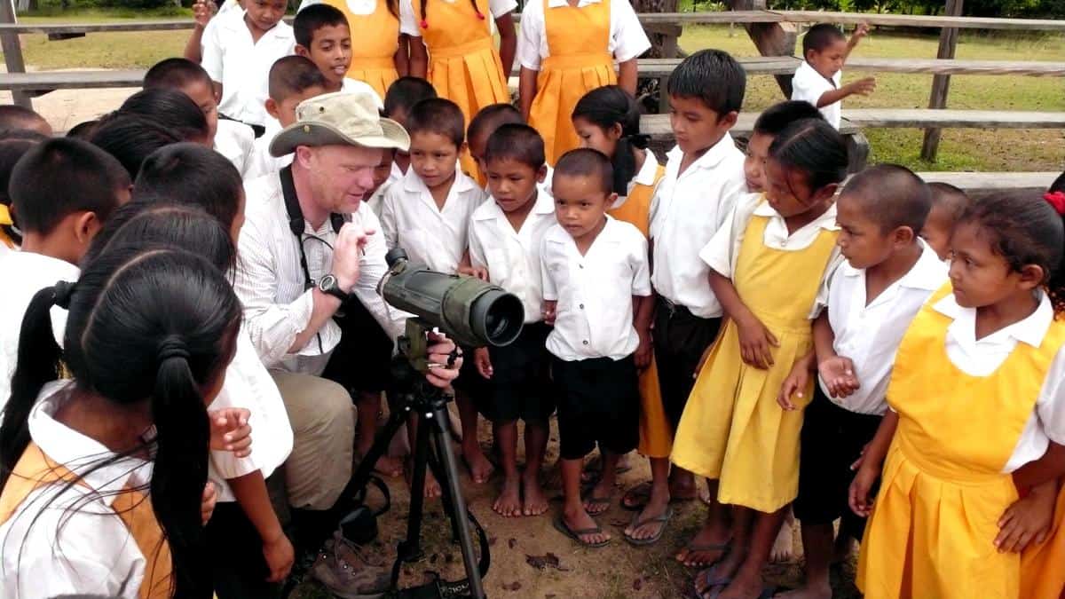 By acquiring knowledge of other places and people, can travel encourage volunteering for global causes? Image by Kevin Loughlin, USAID via PIXNIO (CC0). https://pixnio.com/people/children-kids/the-school-children-from-the-village-of-surama-guyanas-role-model-for-community-led-tourism
