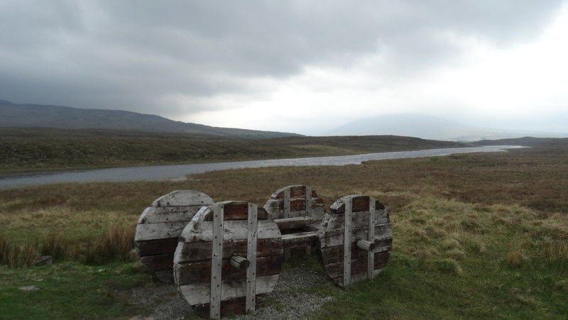 'The Cart' Sculpture on Great Western Greenway near Loch Fada, Derradda by Colin Park (CC BY-SA 2.0) via Geograph.ie. https://www.geograph.ie/photo/5220673