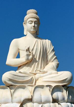 Buddha's statue located near Belum Caves, Andhra Pradesh, India. By Purshi (CC BY-SA 3.0) via Wikimedia. https://commons.wikimedia.org/wiki/File:Buddha%27s_statue_near_Belum_Caves_Andhra_Pradesh_India.jpg "GT" cropped it.