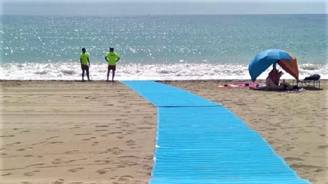 Cuevas del Almanzora council has rolled out "flexi-walkway" matting onto Quitapellejos beach to make it more accessible. Image borrowed from source. https://www.euroweeklynews.com/2020/08/13/bathing-more-accessible-for-beach-goers-with-reduced-mobility/