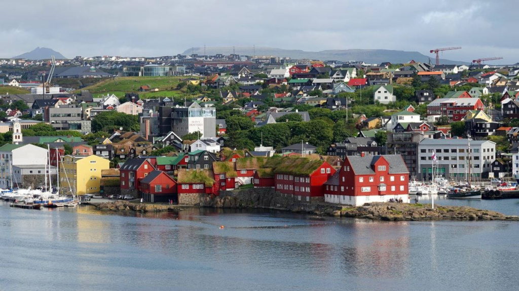 Faroe Islands' capital Tórshavn by Aline Dassel (CC0) via Pixabay. https://pixabay.com/photos/t%c3%b3rshavn-thorshavn-faro-islands-4469757/