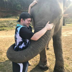 Seable tour guest hugged by an elephant 300sq